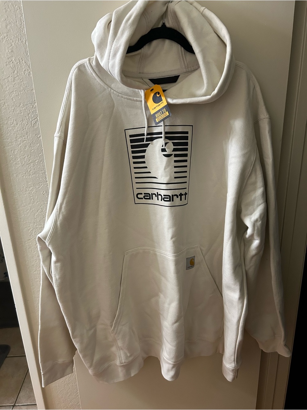Carhartt Off-White Hoodie with Black Logo Graphic
